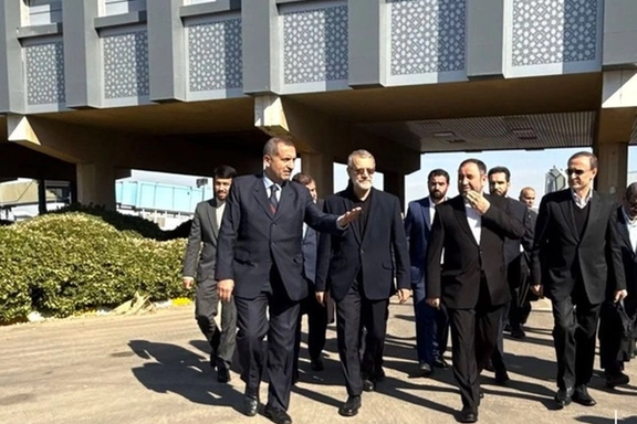 Iran's Supreme Leader's Special Envoy, Ali Larijani (2nd from left), arrives in the Syrian capital, Damascus, on November 14, 2024.