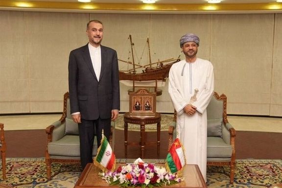Iran's foreign minister Hossein Amir-Abdollahian with his Omani counterpart Badr Albusaidi in Muscat on April 26, 2023