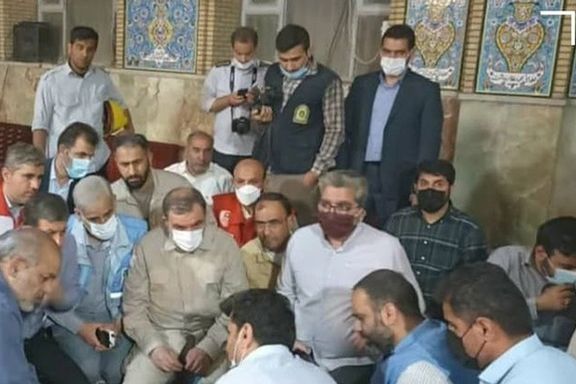 Mohesen Rezaei meeting with officials in Abadan to discuss rescue efforts. May 24, 2022