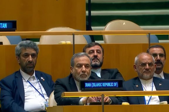 Iranian Foreign Minister Abbas Araghchi listens to Pezeshkian's speech.