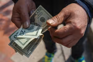 Tehran divided over $2 billion plan to prop up rial