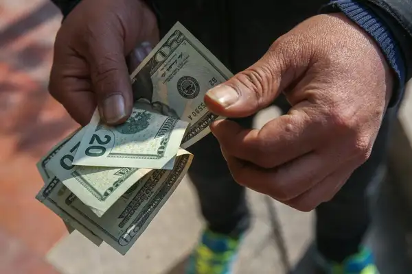 Tehran divided over $2 billion plan to prop up rial