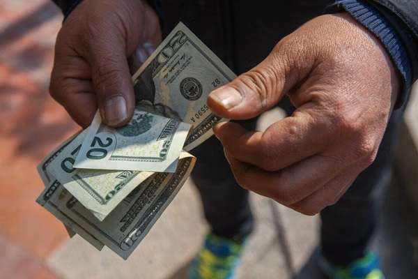 Tehran divided over $2 billion plan to prop up rial