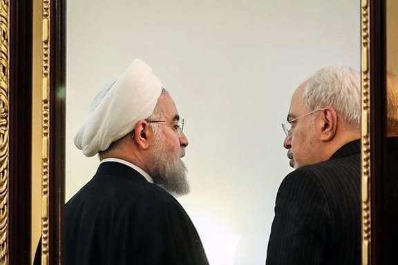 Iran's former foreign minister Mohammad-Javad Zarif (right) and former president Hassan Rouhani