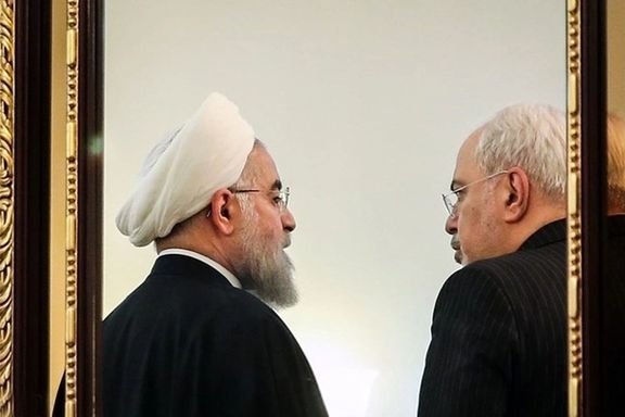 Iran's former foreign minister Mohammad-Javad Zarif (right) and former president Hassan Rouhani
