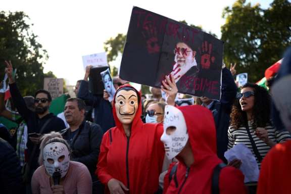 People demonstrate outside the Houses of Parliament during a protest against the Islamic regime of Iran following the death of Mahsa Amini, in central London, Britain, October 8, 2022.