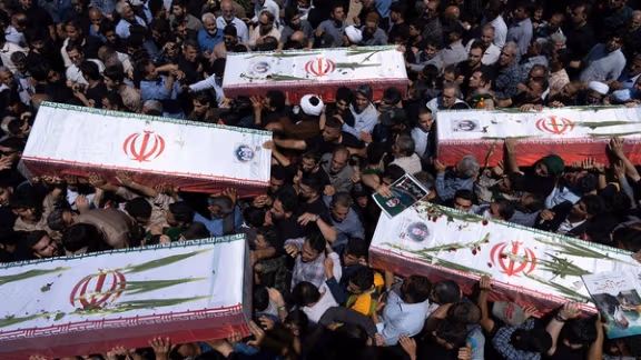 Israel attacks Iran state media, orders evacuations and moots regime change