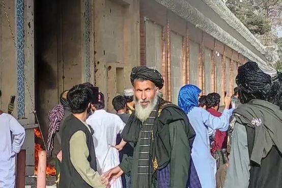 A crowd protesting outside Iran's consulate in Herat on April 11, 2022