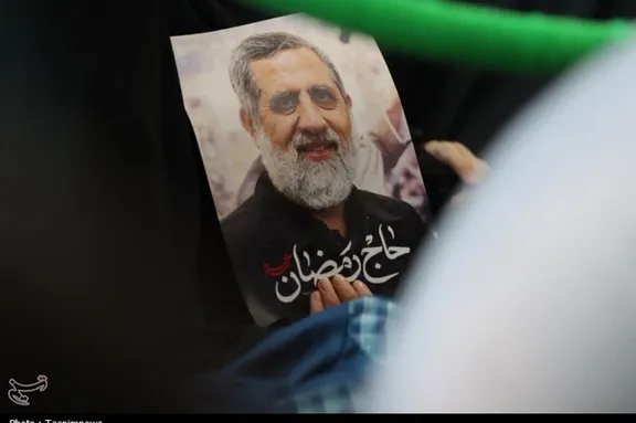 A photo of Hajj Ramazan, an IRGC Quds Force commander in charge of Iran's operations in Palestine killed by Israel, displayed at the ceremony