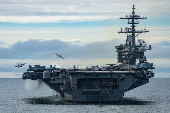 Two F/A-18 Super Hornets, assigned to Carrier Air Wing (CVW) 11, launch from the flight deck of the aircraft carrier USS Theodore Roosevelt (CVN-71) on April 29, 2021.