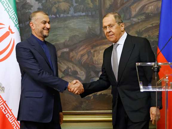 Russian Foreign Minister Sergei Lavrov shakes hands with Iranian Foreign Minister Hossein Amir-Abdollahian during a joint news conference in Moscow, Russia March 15, 2022.