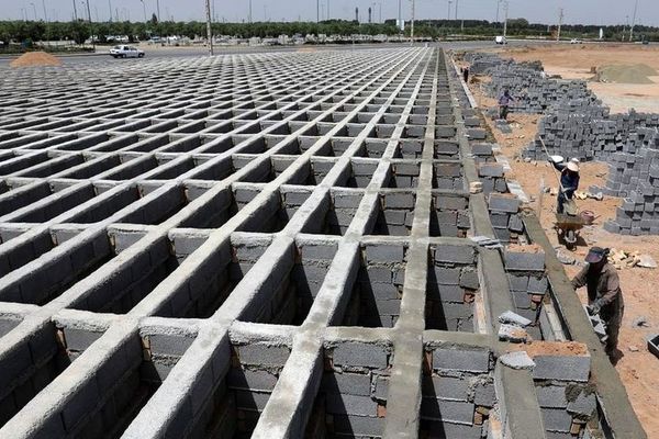 Rights group says Iran ‘concealing evidence’ by turning cemetery into parking lot