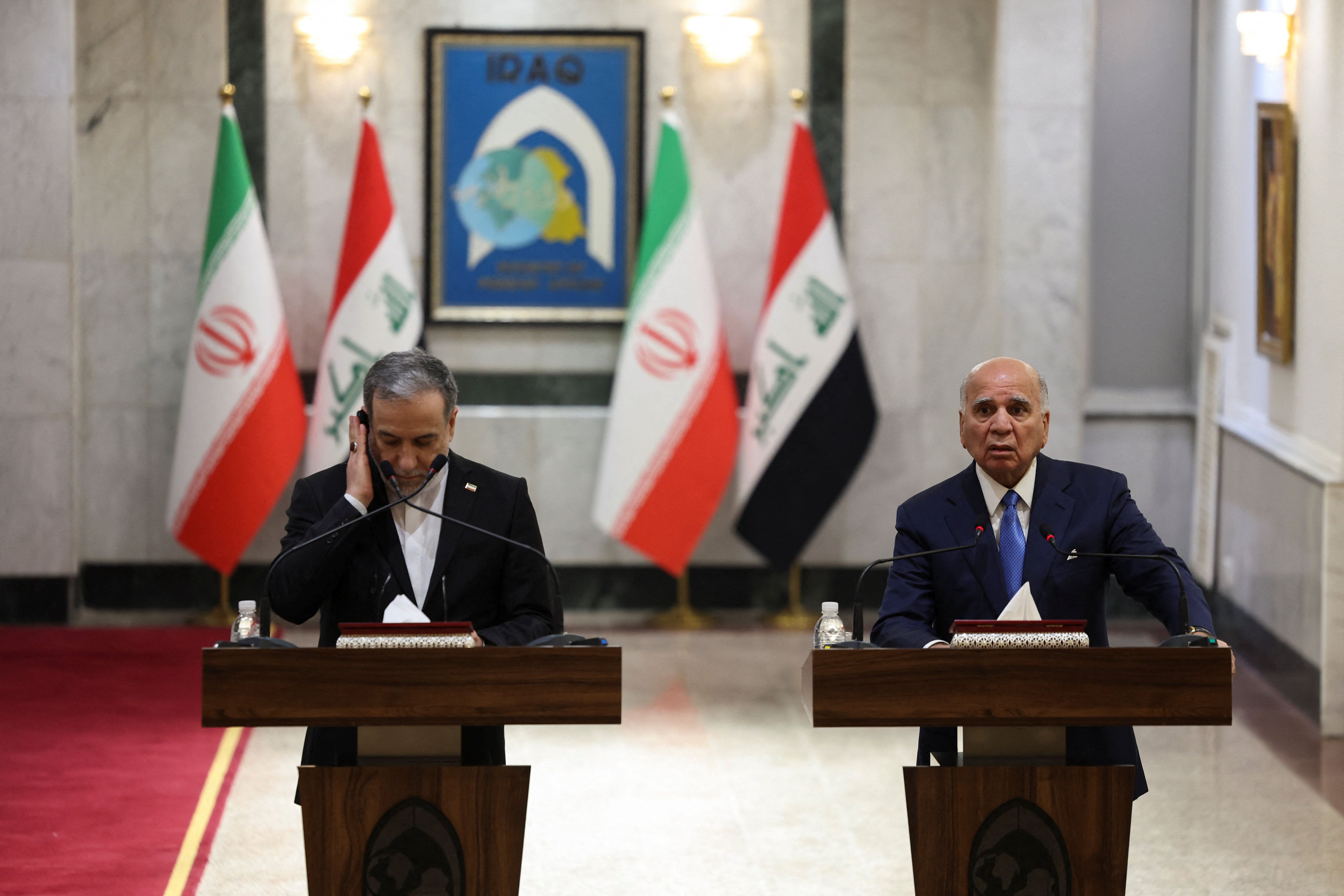 Iraqi Foreign Minister Fuad Hussein and Iranian Foreign Minister Abbas Araqchi attend a press conference in Baghdad, Iraq, June 28, 2026. 