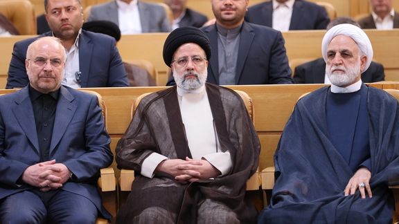 (From left to right) Parliament Speaker Mohammad-Bagher Ghalibaf, Iran’s President Ebrahim Raisi, and Chief Justice Gholam-Hossein Mohseni-Ejei during an event in Tehran on June 26, 2023