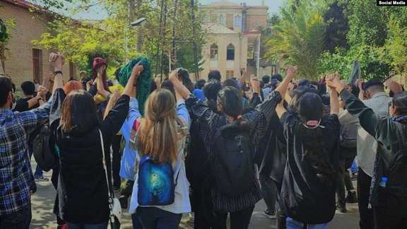 Students of the Art Faculty of University of Tehran unveiled at the campus to protest against mandatory hijab on October 18, 2022.