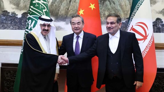 Wang Yi, China’s chief diplomat, Ali Shamkhani (right), Iran’s former national security chief, and Saudi representative Musaad bin Mohammed Al Aiban in Beijing, March 10, 2023