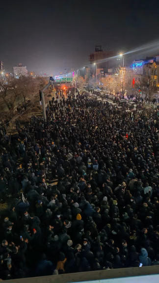 Protesters gather in northeastern Mashhad during anti-government demonstrations in January.