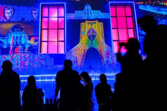 File photo by ISNA shows people attending Tehran's Design Week event