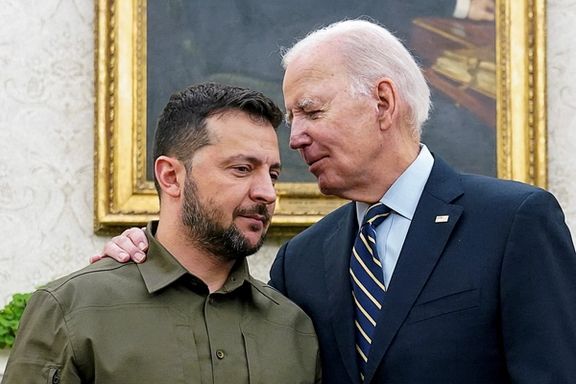 Ukrainian President Volodymyr Zelenskiy is embraced by US President Joe Biden in the Oval Office of the White House in Washington, September 21, 2023.
