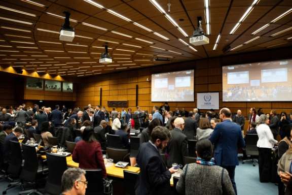 People arrive for the quarterly board of governors meeting at the IAEA headquarters in Vienna, Austria, November 19, 2025.