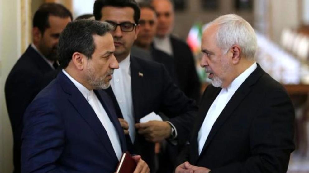 A file photo showing then-foreign minister Javad Zarif speaking with his deputy Abbas Araghchi.