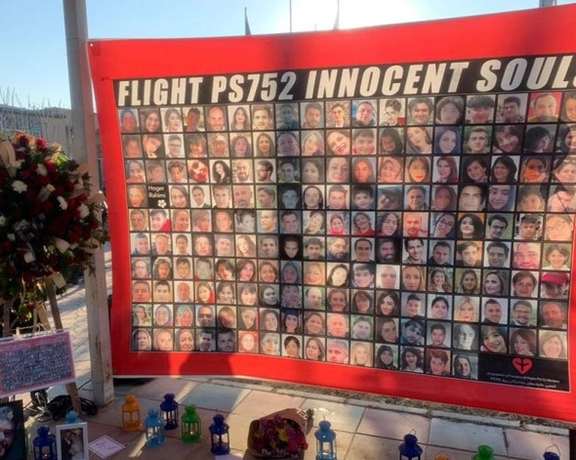 A banner commemorating the victims of the downed airliner.
