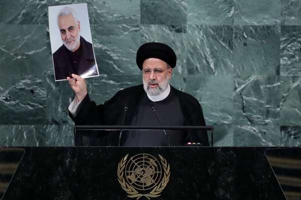 Raisi Pledges Continued Support For Proxies, As Biden Warns Iran