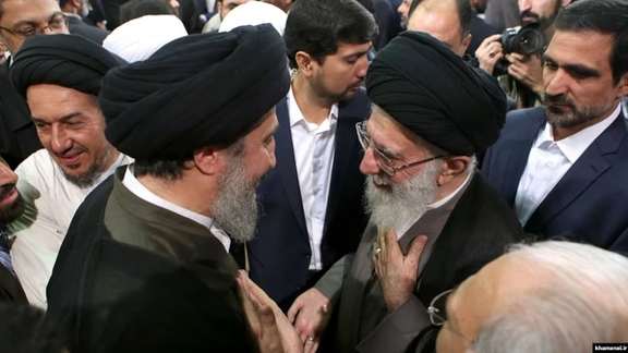 Hameed al-Hussaini, the director Iraq’s section of the Islamic Radio and Television Union, and Iran’s Supreme Leader Ali Khamenei (right)