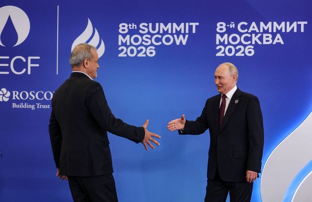 Russian President Vladimir Putin shakes hands with Iranian President Masoud Pezeshkian during the official welcoming ceremony at the Summit of Heads of State and Government of the Gas Exporting Countries Forum (GECF) in Moscow, Russia, October 27, 2026.
