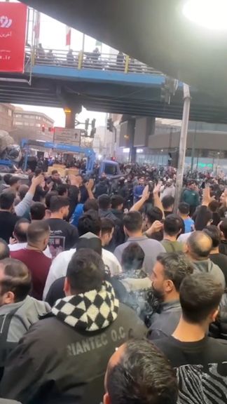 Tehran shopkeepers protest currency plunge as rial hits all-time low