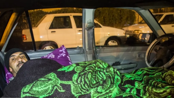 Behind the wheel, under the stars: The story of Tehran’s car-sleeping drivers