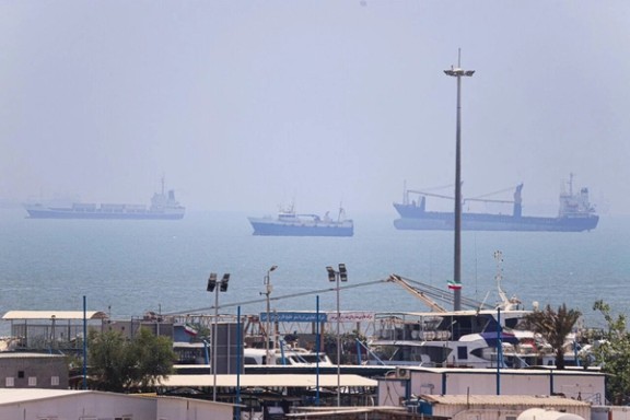Ships are seen in the Strait of Hormuz from southern Iran on June 18, 2026.