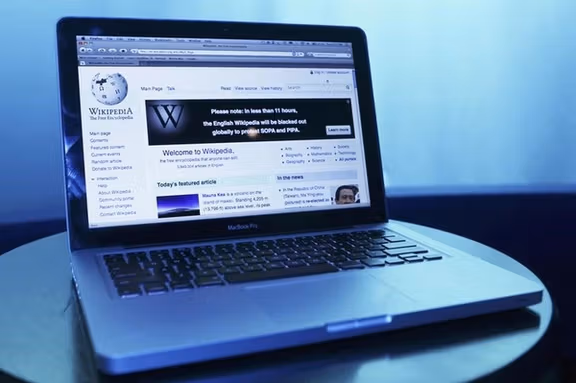 Wikipedia webpage in use on a laptop computer