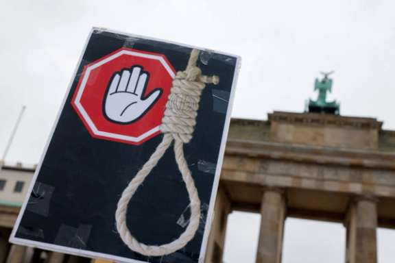 A placard is seen during a protest against the Islamic regime of Iran following the death of Mahsa Amini, in Berlin, Germany, December 10, 2022.