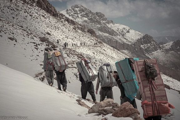 A kolbar is a worker who carries goods on his/her back across the borders of Iran, Iraq, Syria and Turkey legally or illegally.