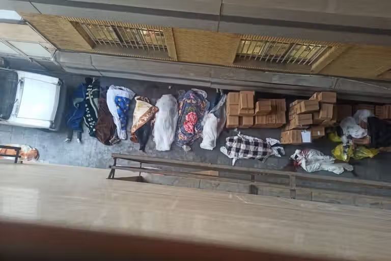 Bodies wrapped in blankets lie outside Alghadir Hospital in eastern Tehran following anti-government protests in January 2026.
