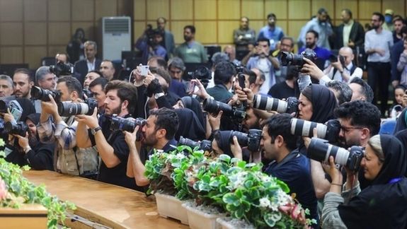 The press present at Iran's Interior Ministry building where presidential elections candidates registered their bid