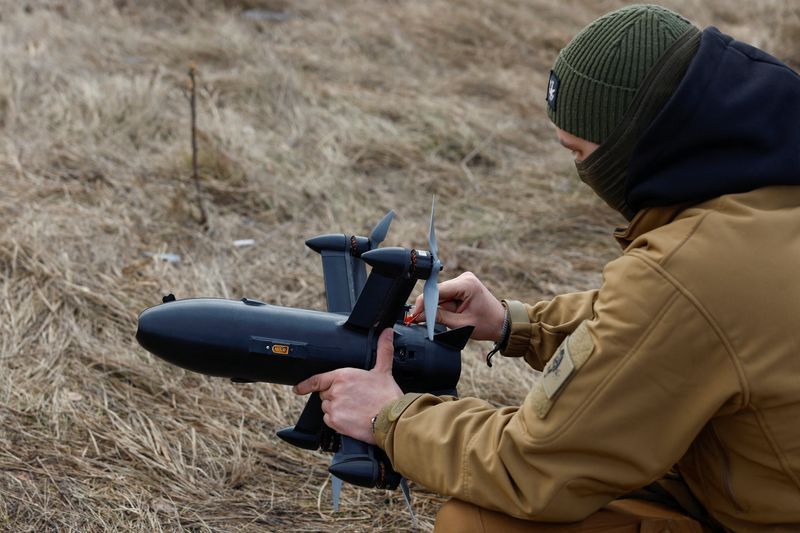 An employee checks a P1-Sun FPV interceptor drone before flying it at a training academy, in an undisclosed location, Ukraine March 6, 2026.