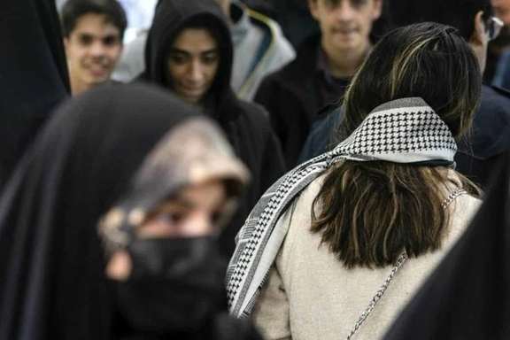 An Iranian woman with loose hijab in Tehran