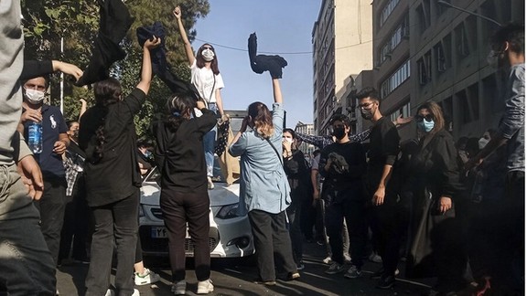 People chanting anti-regime slogans on streets during a protest rally in Tehran