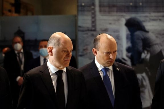 German Chancellor Olaf Scholz stands next to Israeli Prime Minister Naftali Bennett visiting Yad Vashem Holocaust Remembrance Center in Jerusalem, March 2, 2022.