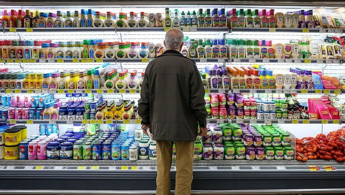 An Iranian shopper facing skyrocketing food prices at a chain market