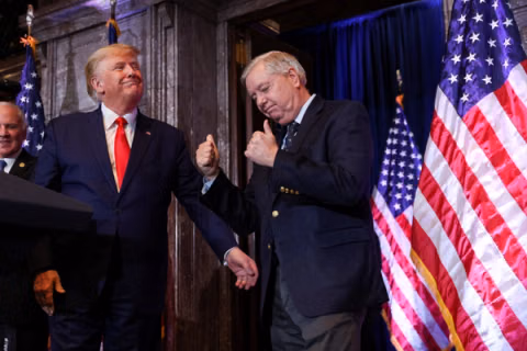 Trump waives some Moscow sanctions under Graham Russia-Iran Act