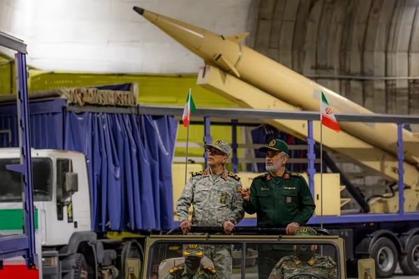 Iran unveils underground missile site under shadow of US threats