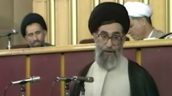 Khamenei speaking in the meeting where he was selected as Supreme Leader in une 1989, with Hashemi Rafsanjani seen in the background