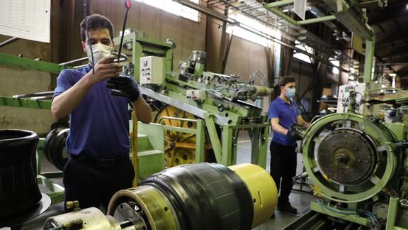 Workers busy at an Iranian factory
