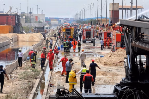 Iranian Red Crescent rescuers work following an explosion at the Rajaei port in Bandar Abbas, Iran, April 27, 2025.