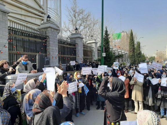 Female teachers gathered outside the Iranian parliament on Tuesday.