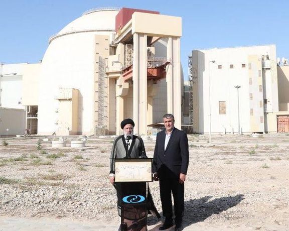 Iranian President Ebrahim Raisi (left) and head of Iran's Atomic Organization Mohammad Eslami during a visit to Bushehr nuclear power plant, in the city of Bushehr, southern Iran