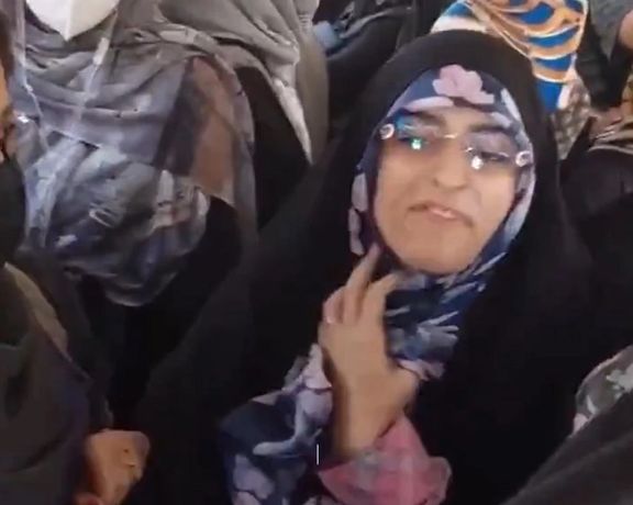 Frame grab show the woman enforcing hijab and threatening anti-hijab protesters in a city bus in Tehran on July 16.
